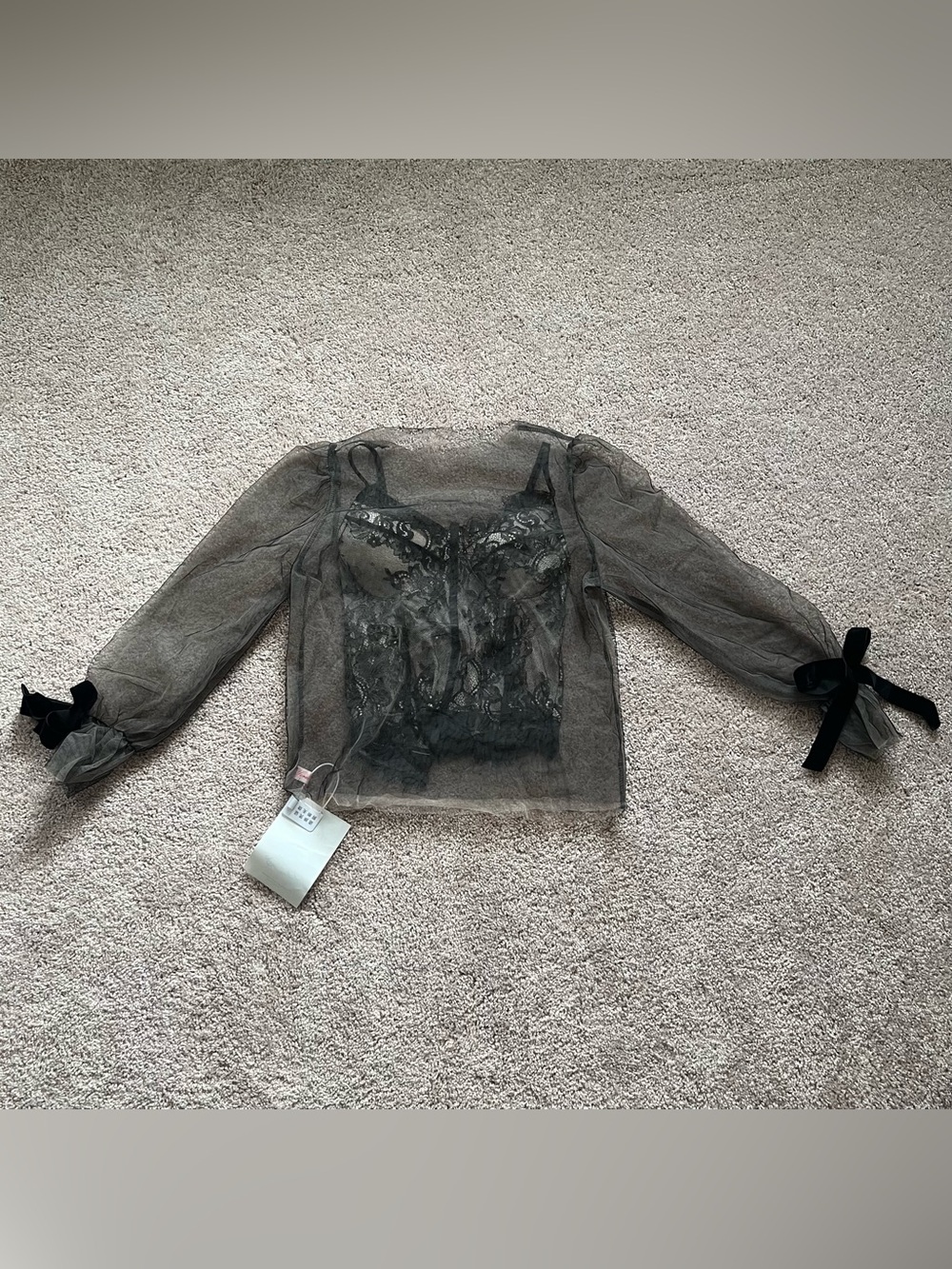 Sheer black blouse